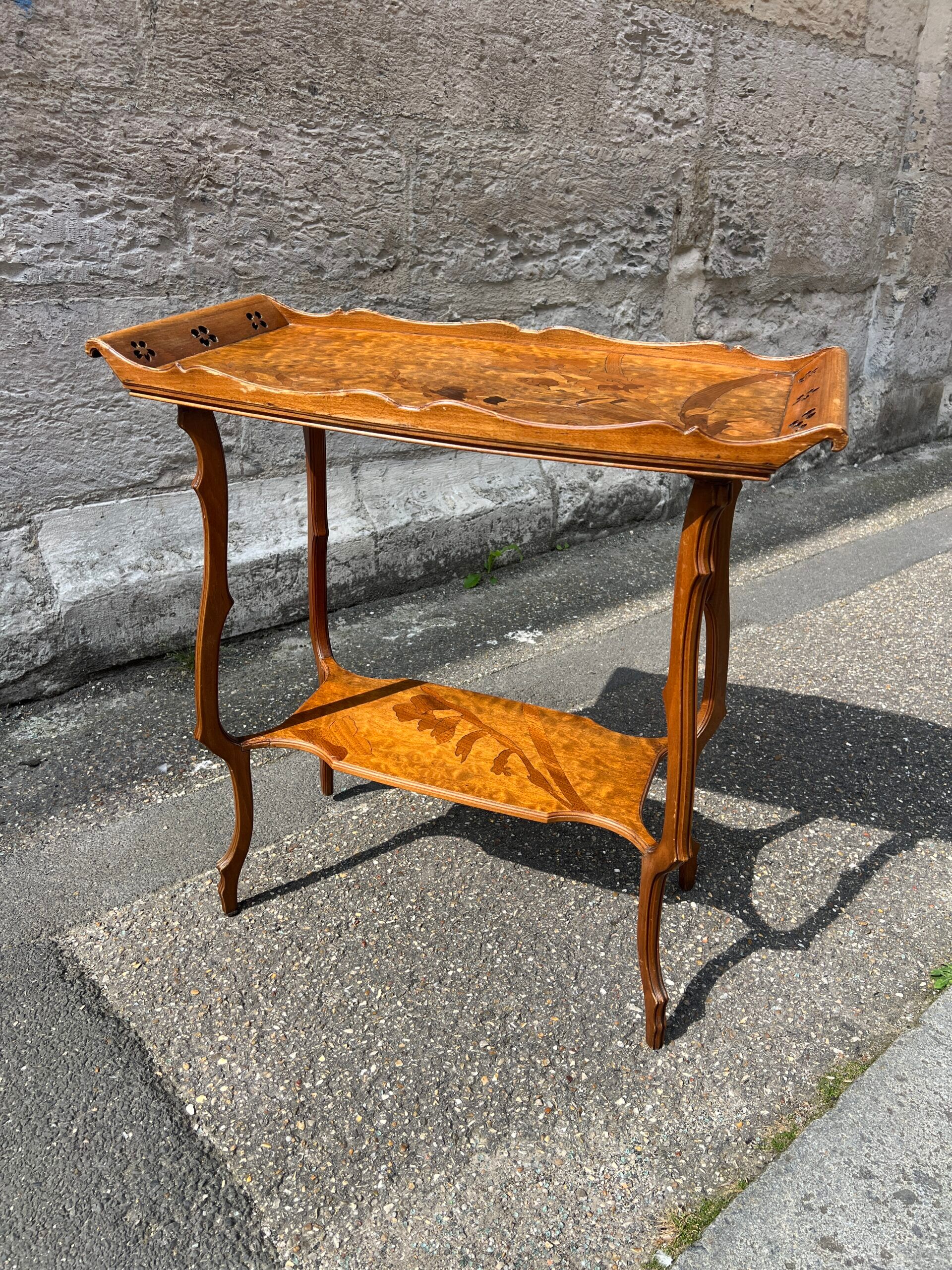 Art Nouveau period two-tiered tea table in veneered wood, signed Émile Gallé