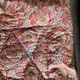 Vintage duvet/bedspread with a paisley pattern.