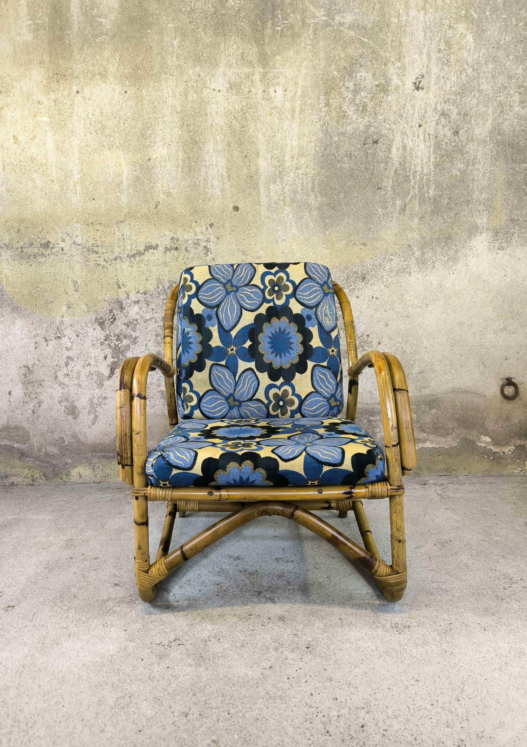 Vintage armchair in rattan and floral fabric