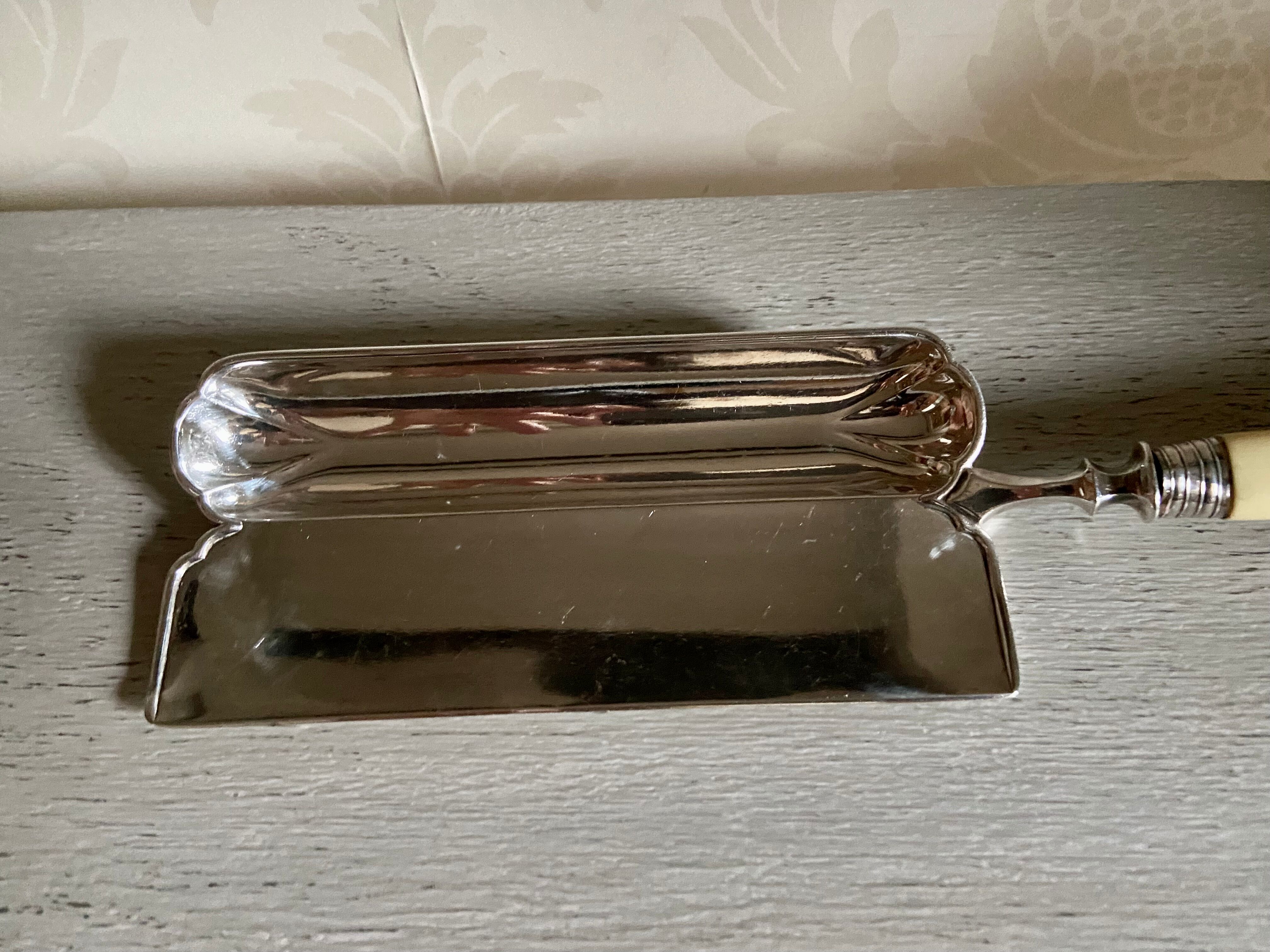 Old silver metal crumb tray