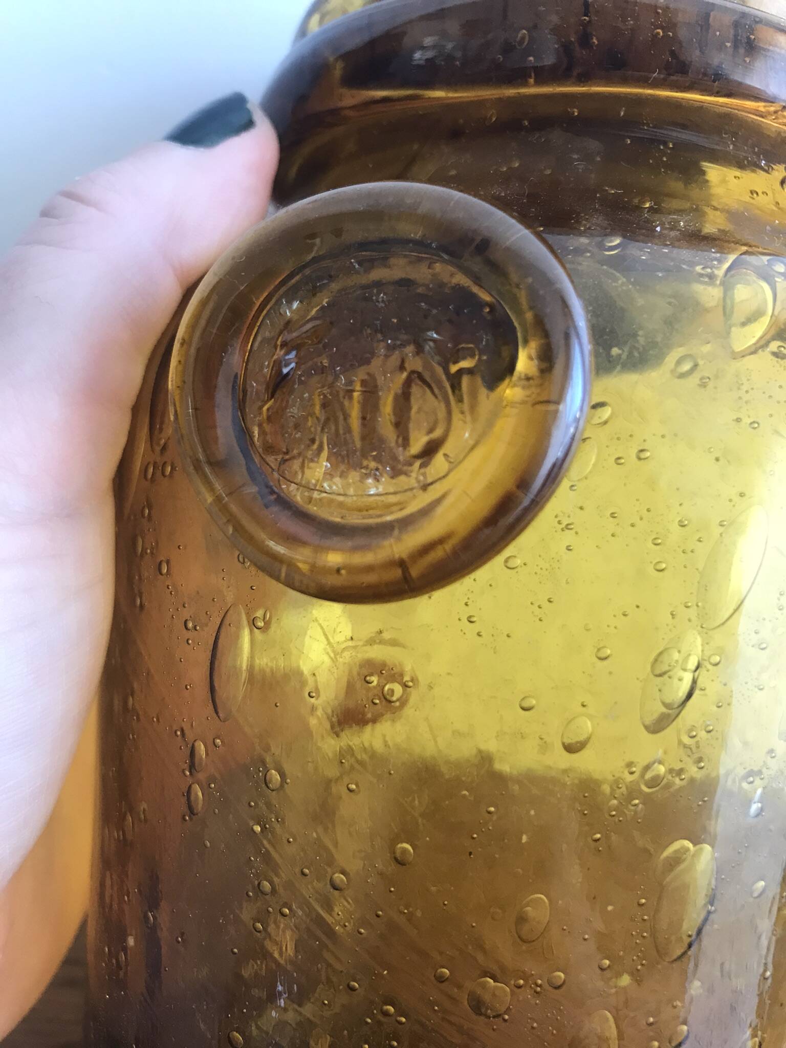 Handmade jar in blown bubbled glass Biot amber