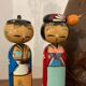 Pair of Kokeshi dolls