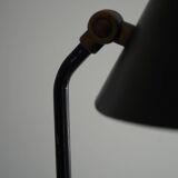 Modern adjustable Danish table lamp in metal, made by Louis Poulsen, 1950s.