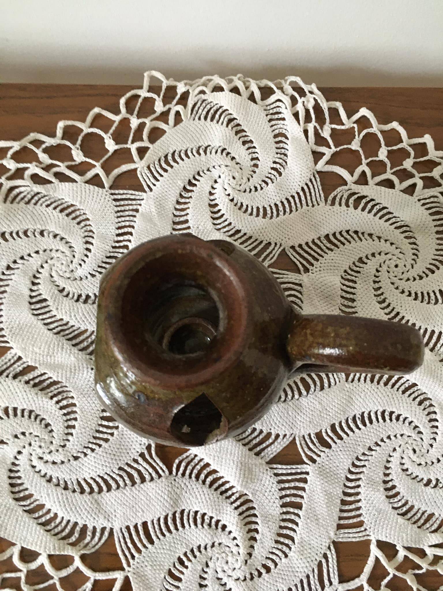 Brown stoneware tealight holder with handle