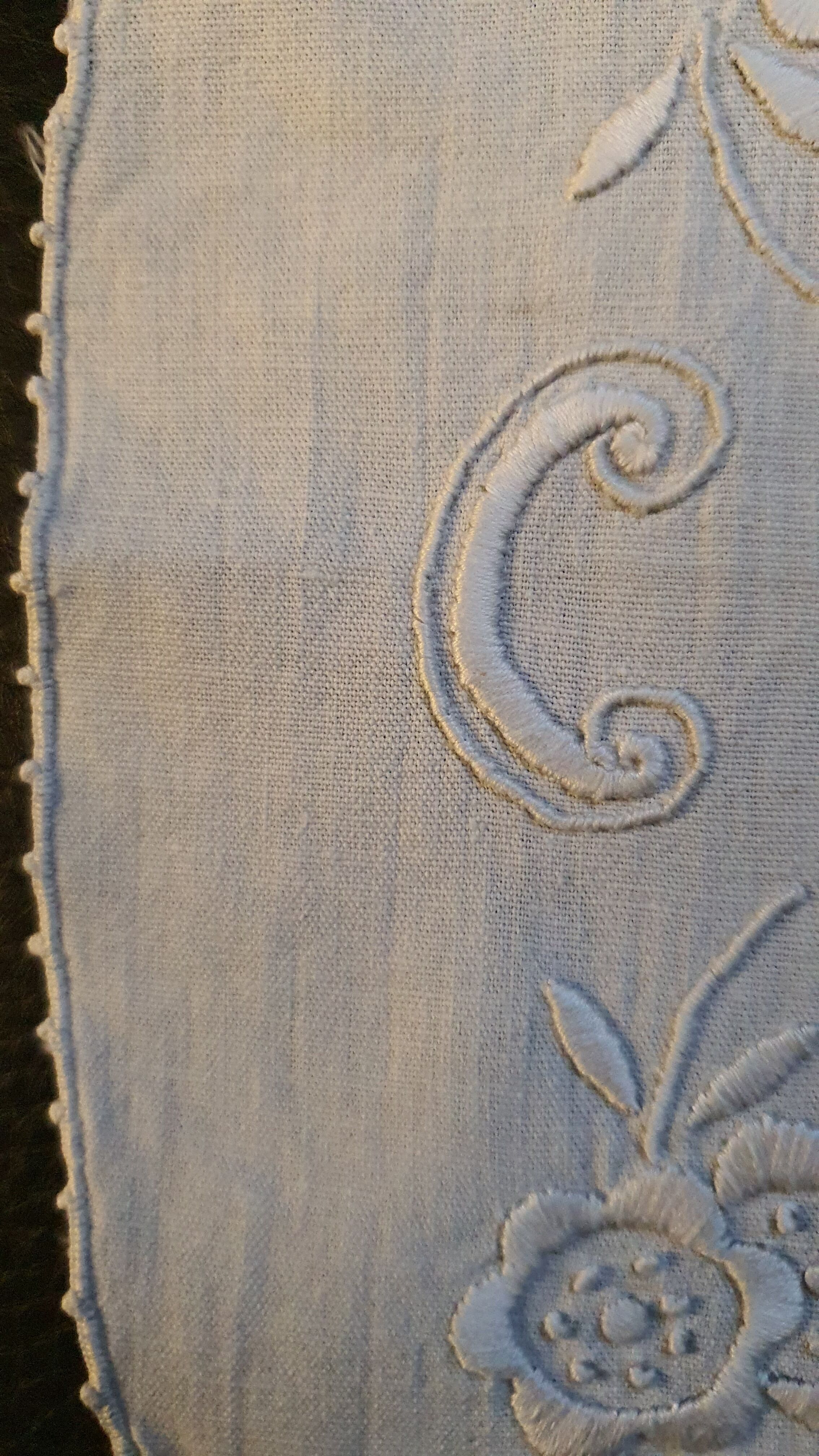 Hand-embroidered oval placemat