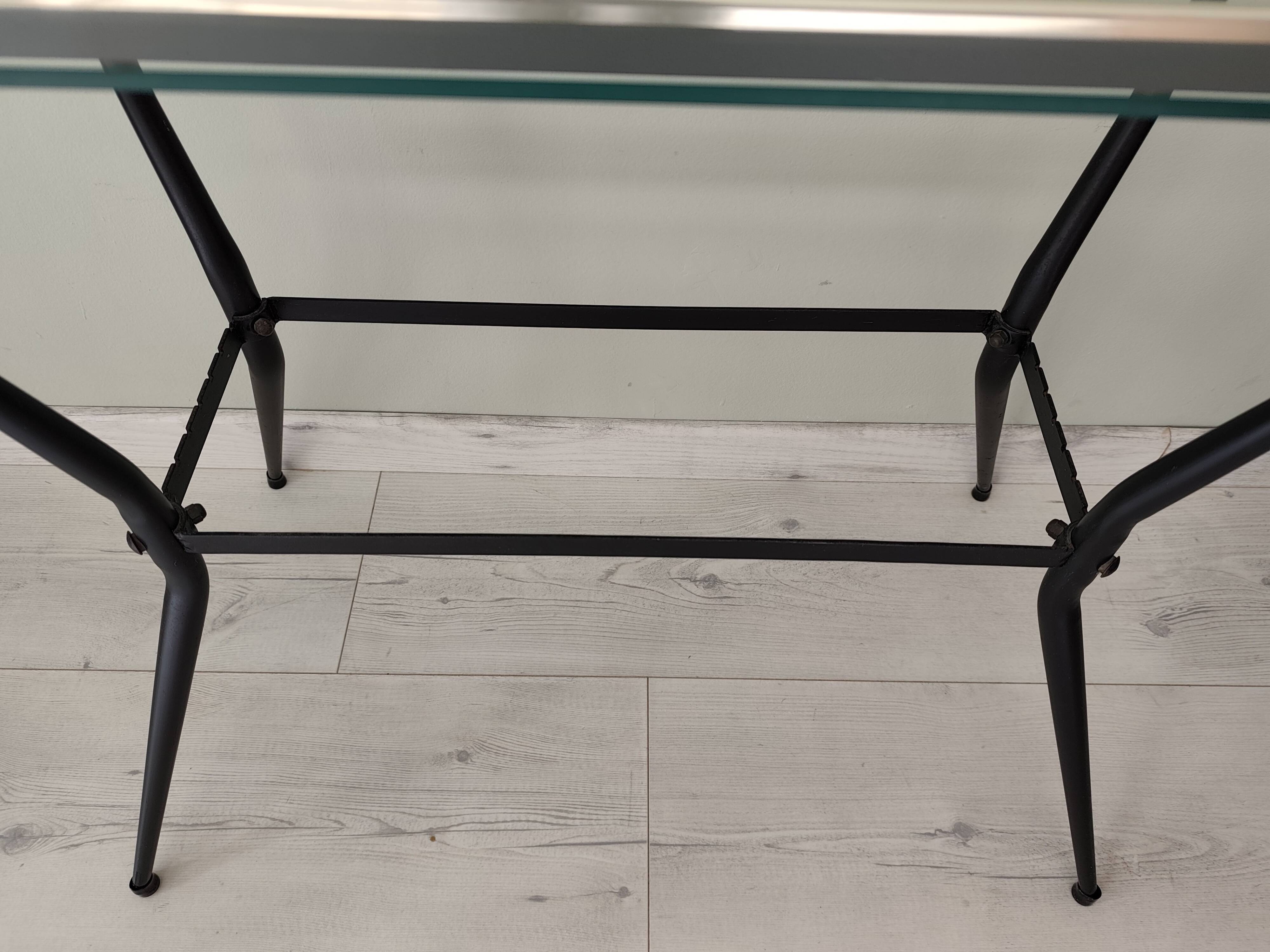 Antique side table made of metal and glass