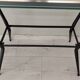 Antique side table in metal and glass