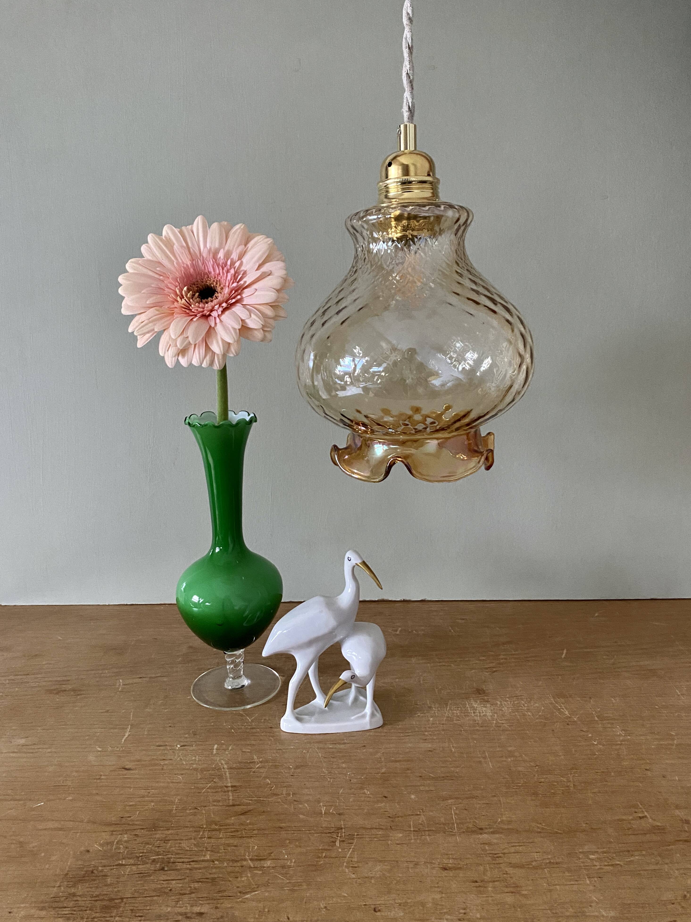 Vintage globe pendant light in amber glass