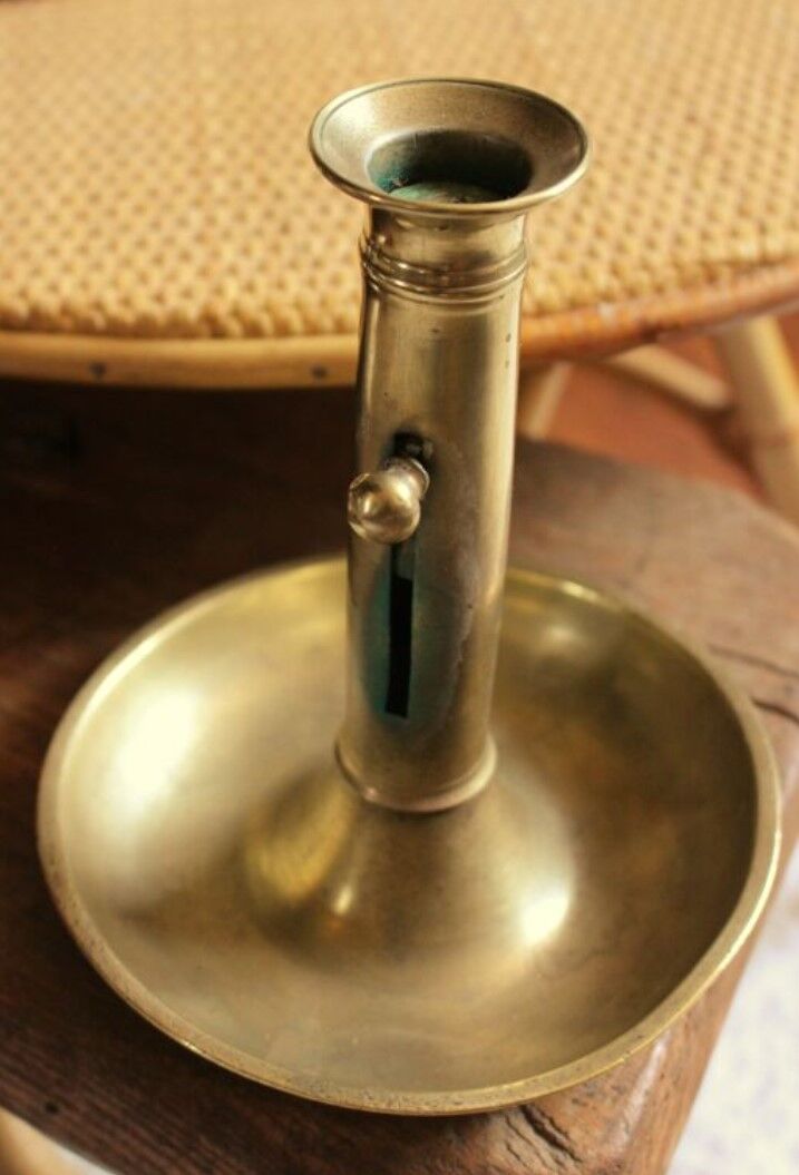 Brass pusher round cut candle holder