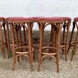 Lot de 7 tabourets de bar en bois courbé assise skaï rouge