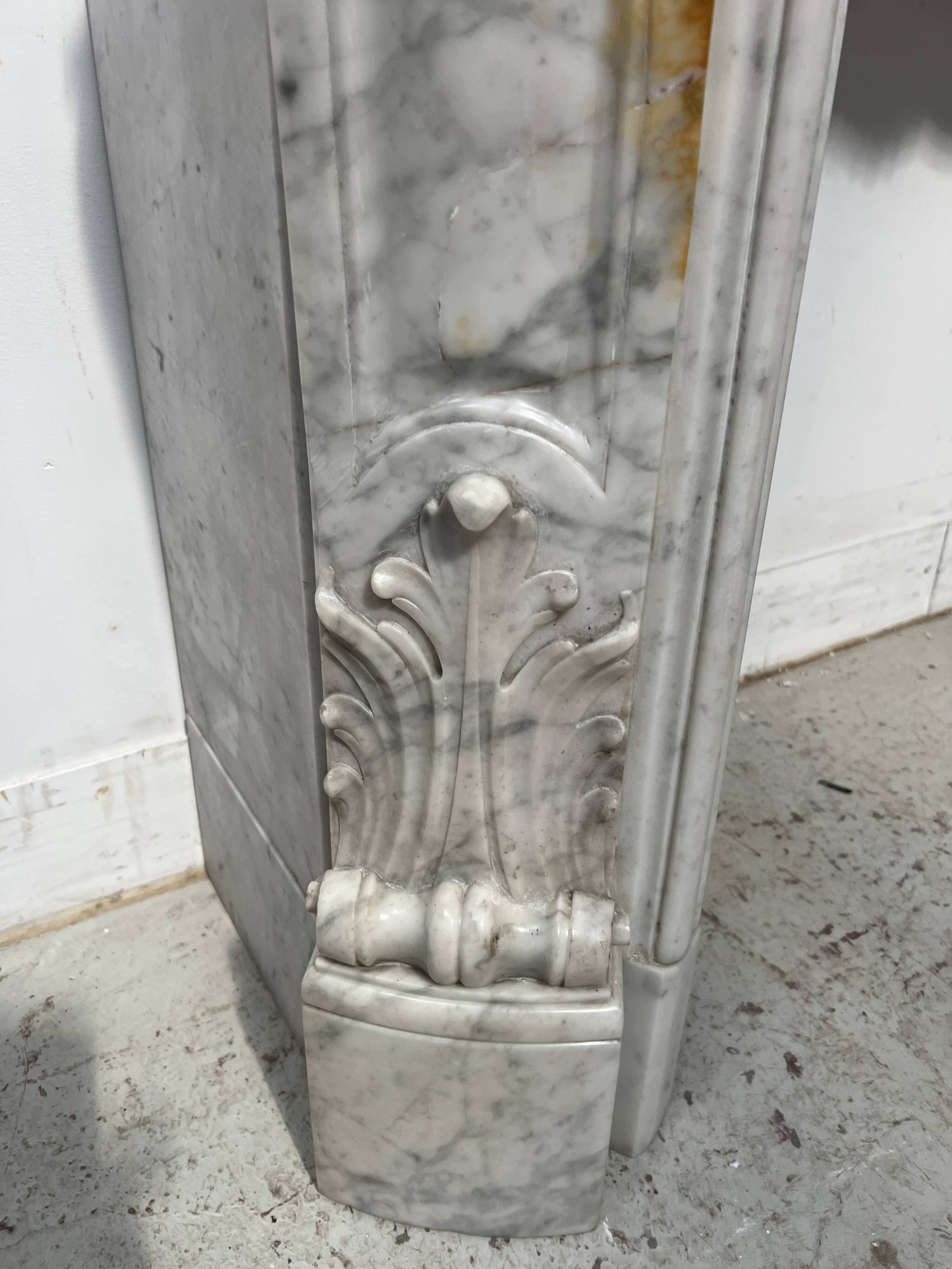 Louis XV style white Carrara marble fireplace, 19th century.