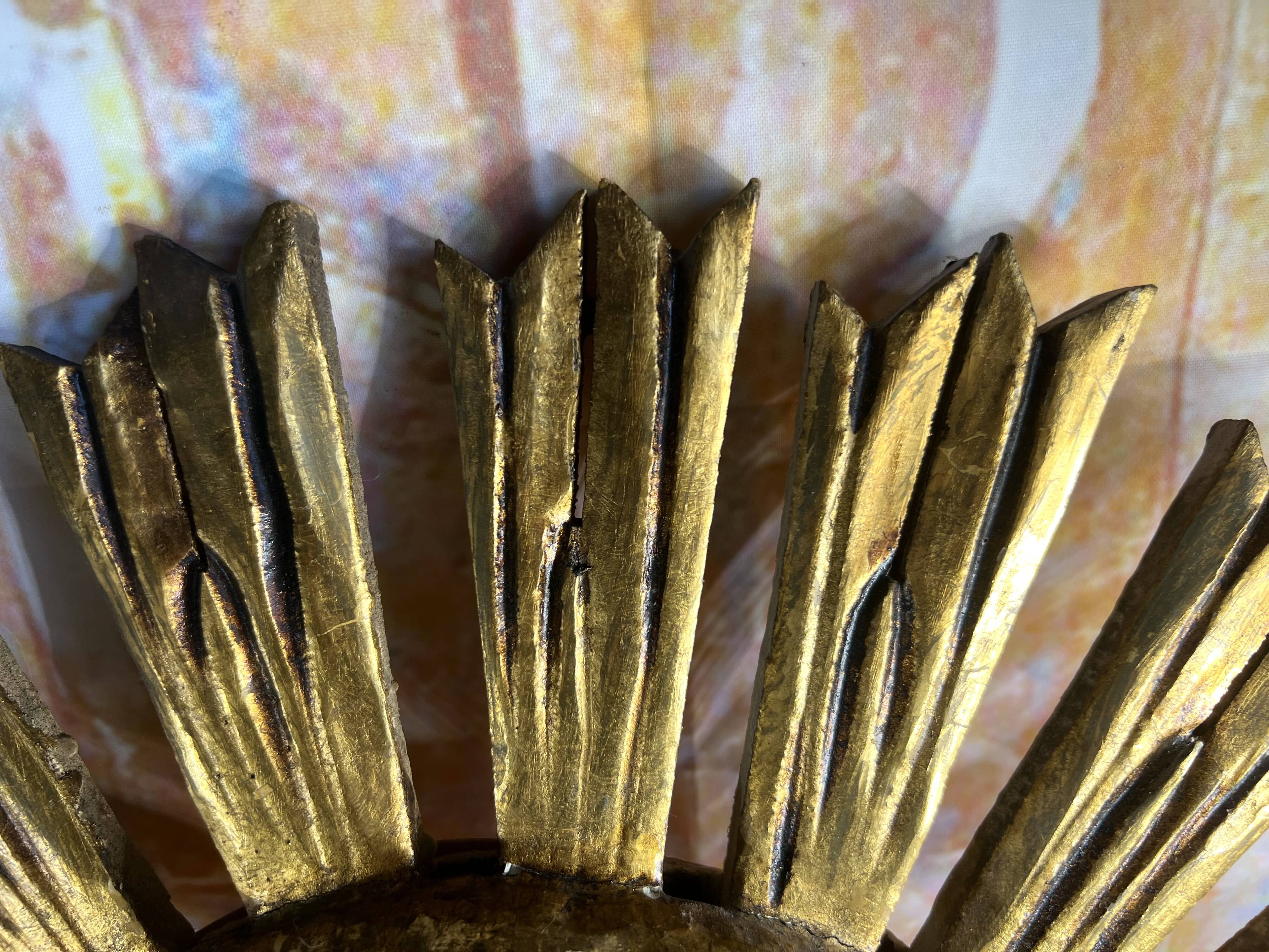 Sunburst mirror in gilded wood