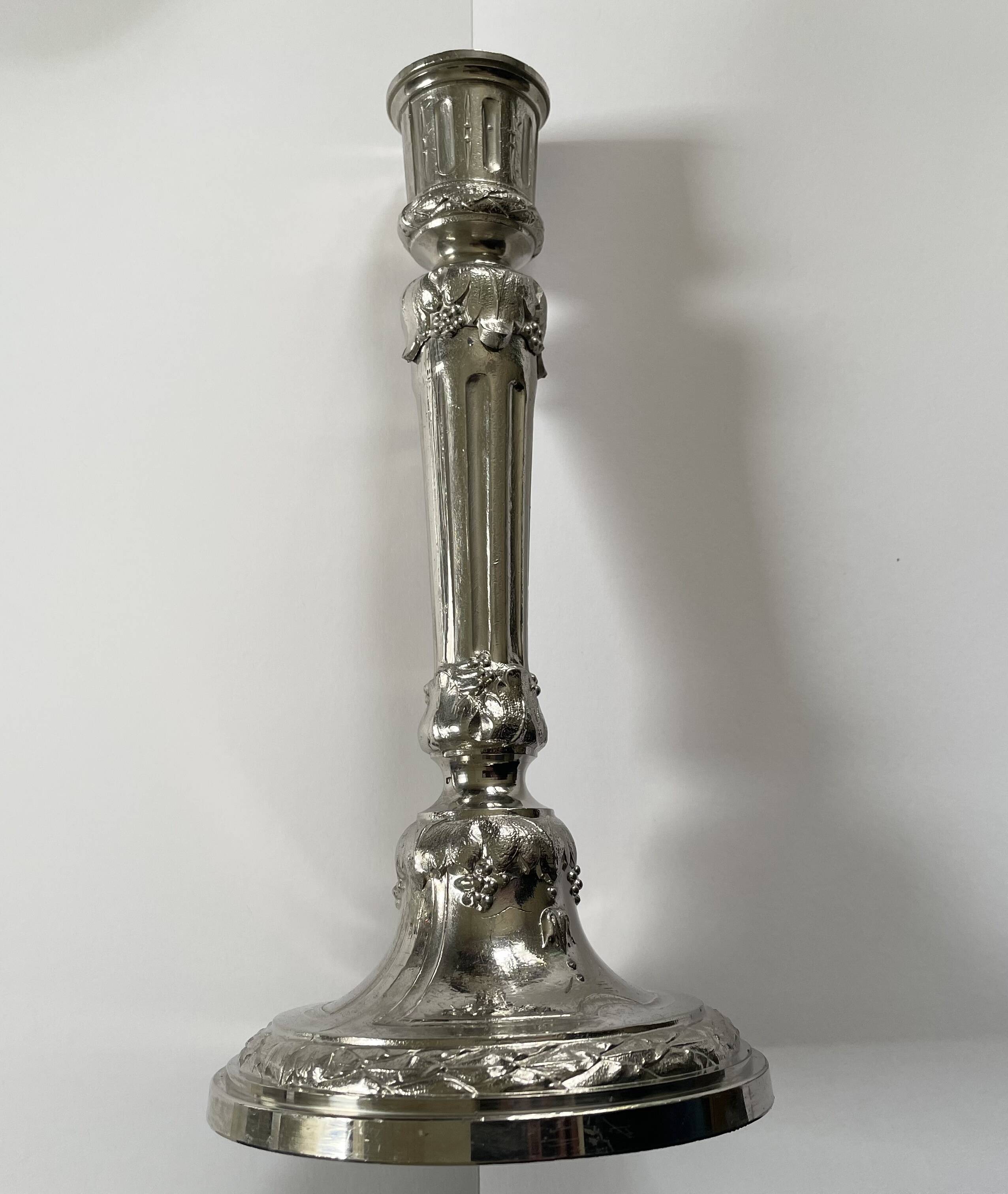 Antique silver-plated candlesticks in classic style