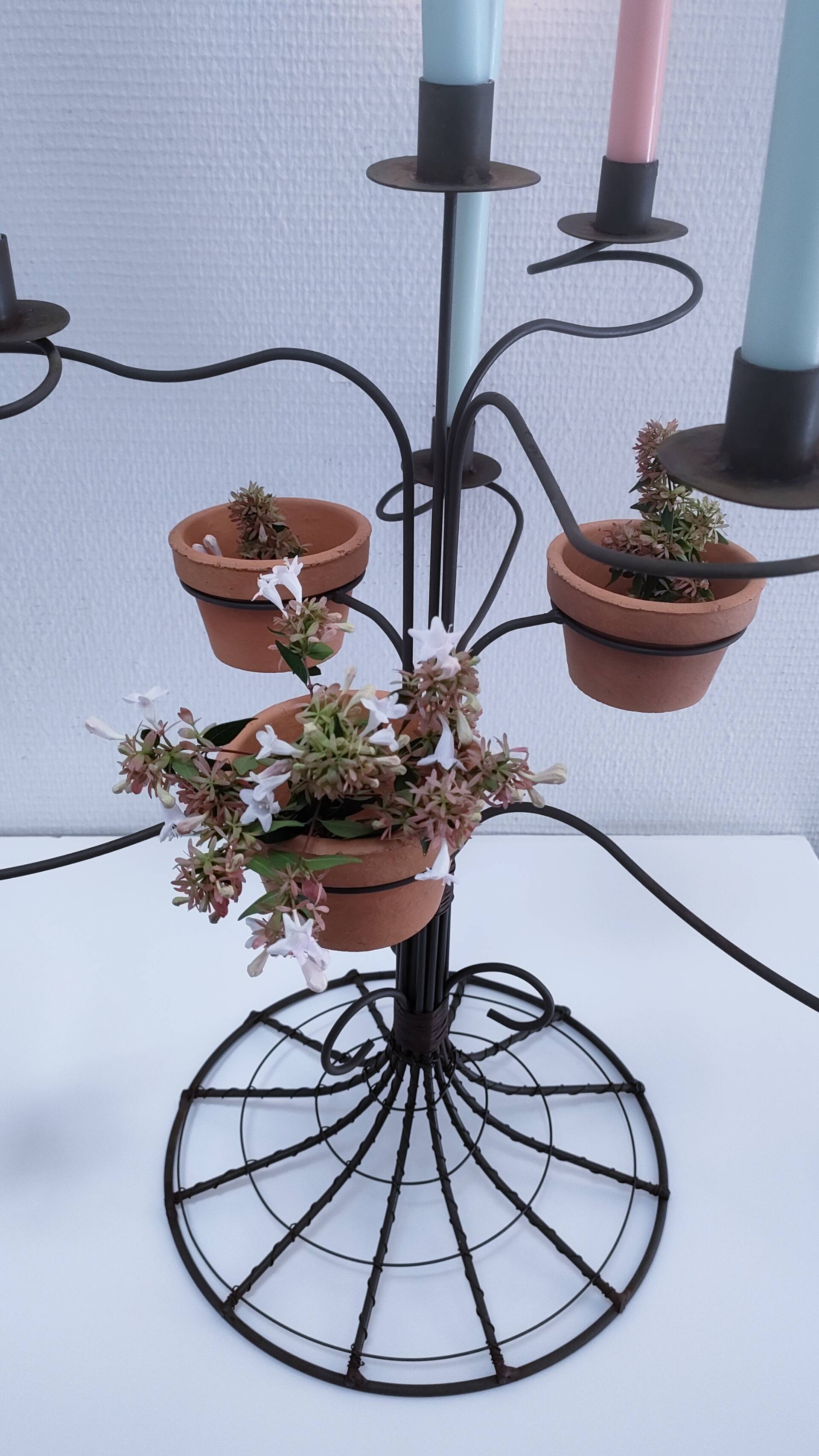 Vintage seven-light terracotta metal candlestick