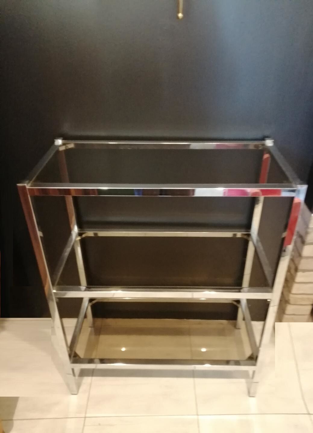 Shelf 70s chrome and smoked glass.
