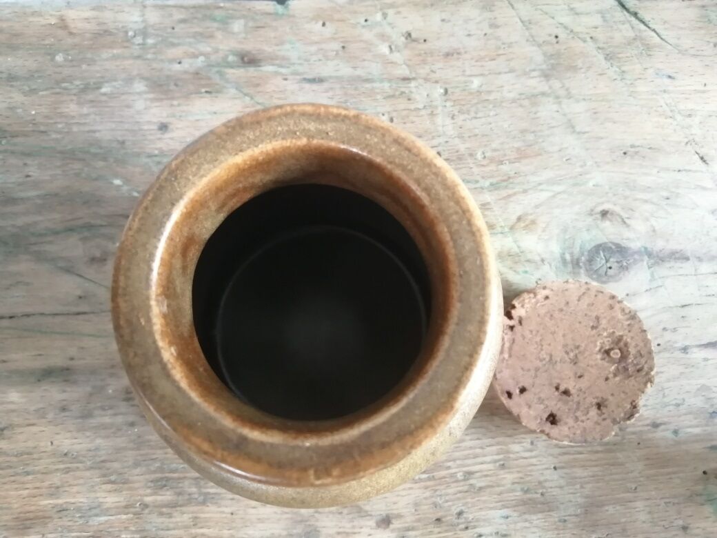 Old sandstone pot with cork