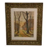Lithograph of a woodland path, gilt frame, with embossed foliage decoration, 1950s