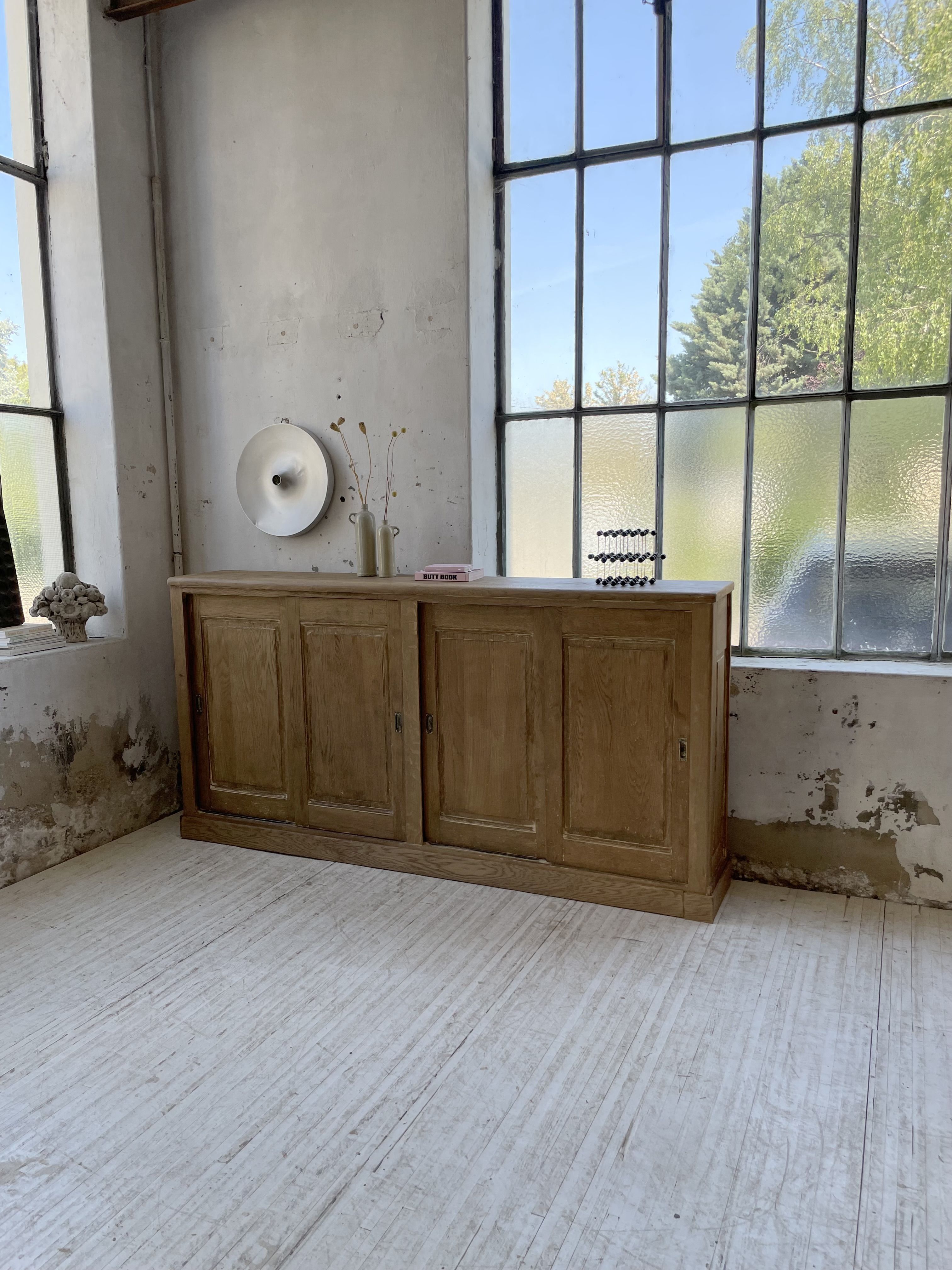 Large row of solid oak loom sliding doors