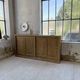 Large row of solid oak loom sliding doors