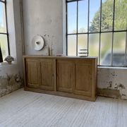 Large row of solid oak loom sliding doors