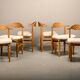 Henning Kjærnulf dining chairs set in Oak and Sheepskin, Denmark, 1960s