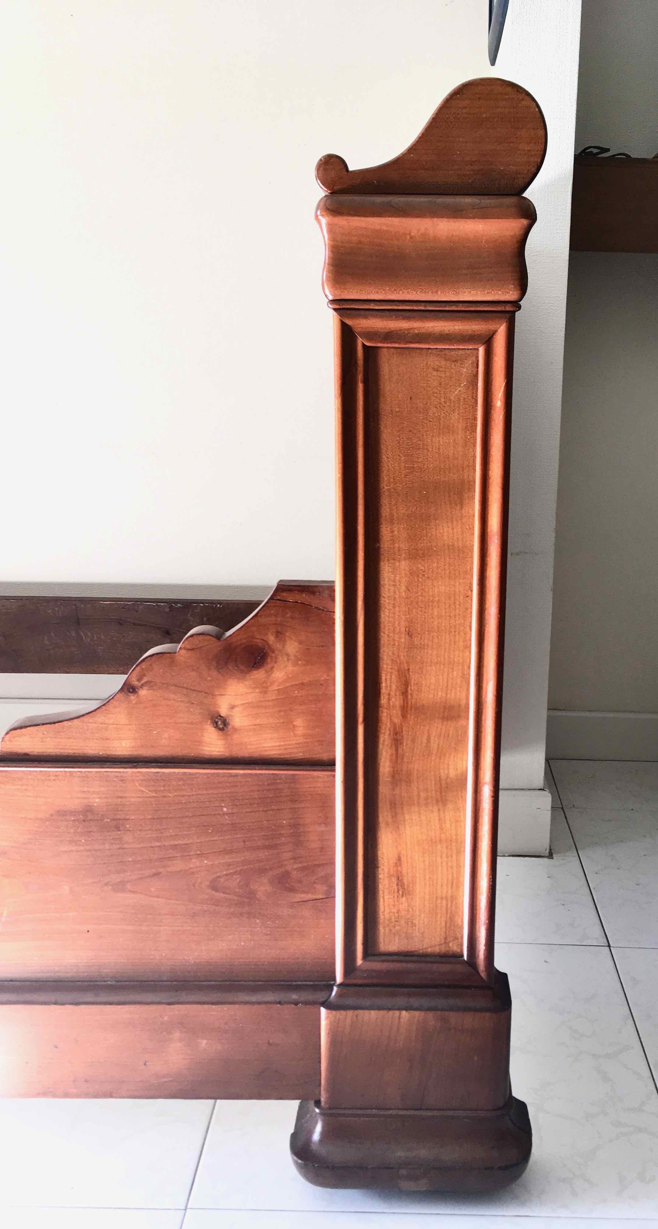 Cherry wood boat bed with bedding