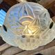 Art Deco suspension in moulded-pressed glass with geometric decoration signed Degué.