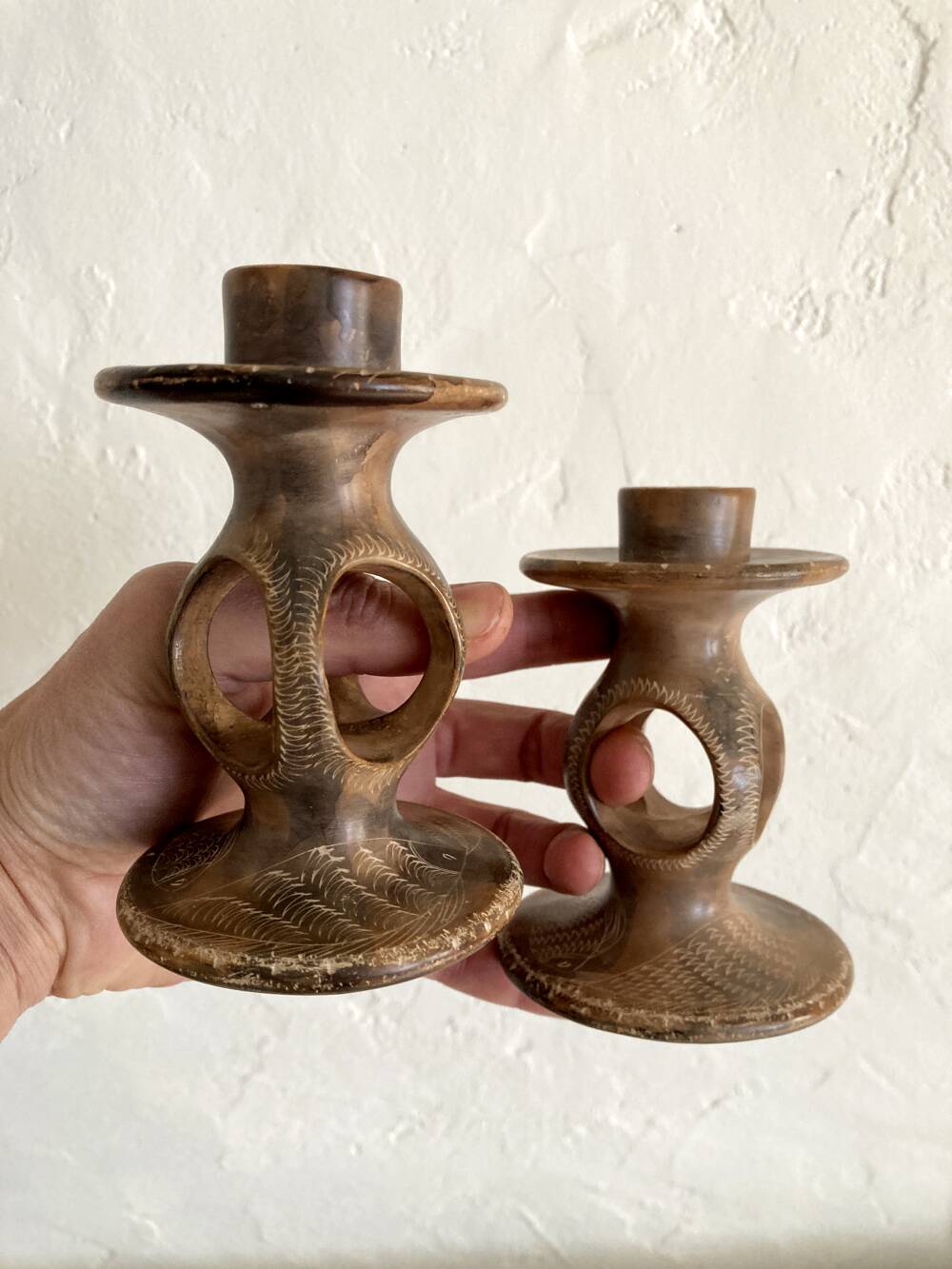 Pair of soapstone candlesticks, Kenya