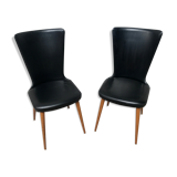 Pair of Baumann model Essor chairs in faux black leather, beech compass footing