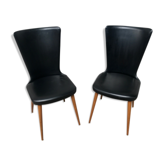 Pair of Baumann model Essor chairs in faux black leather, beech compass footing