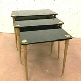 Pull out tables in brass and black glass XX century