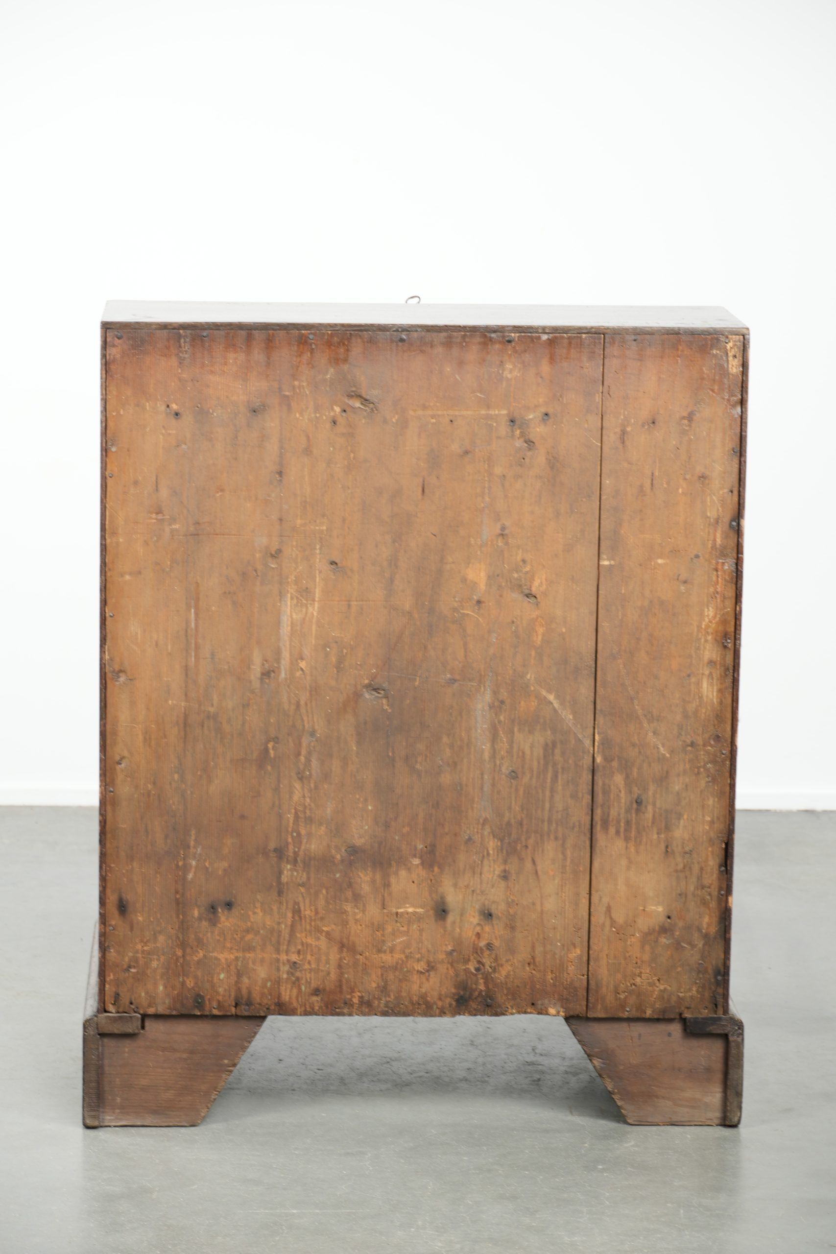 Antique English oak secretary from the 18th century with a stepped interior