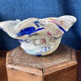 Multi-layer glass ashtray with metallic oxide inclusions.