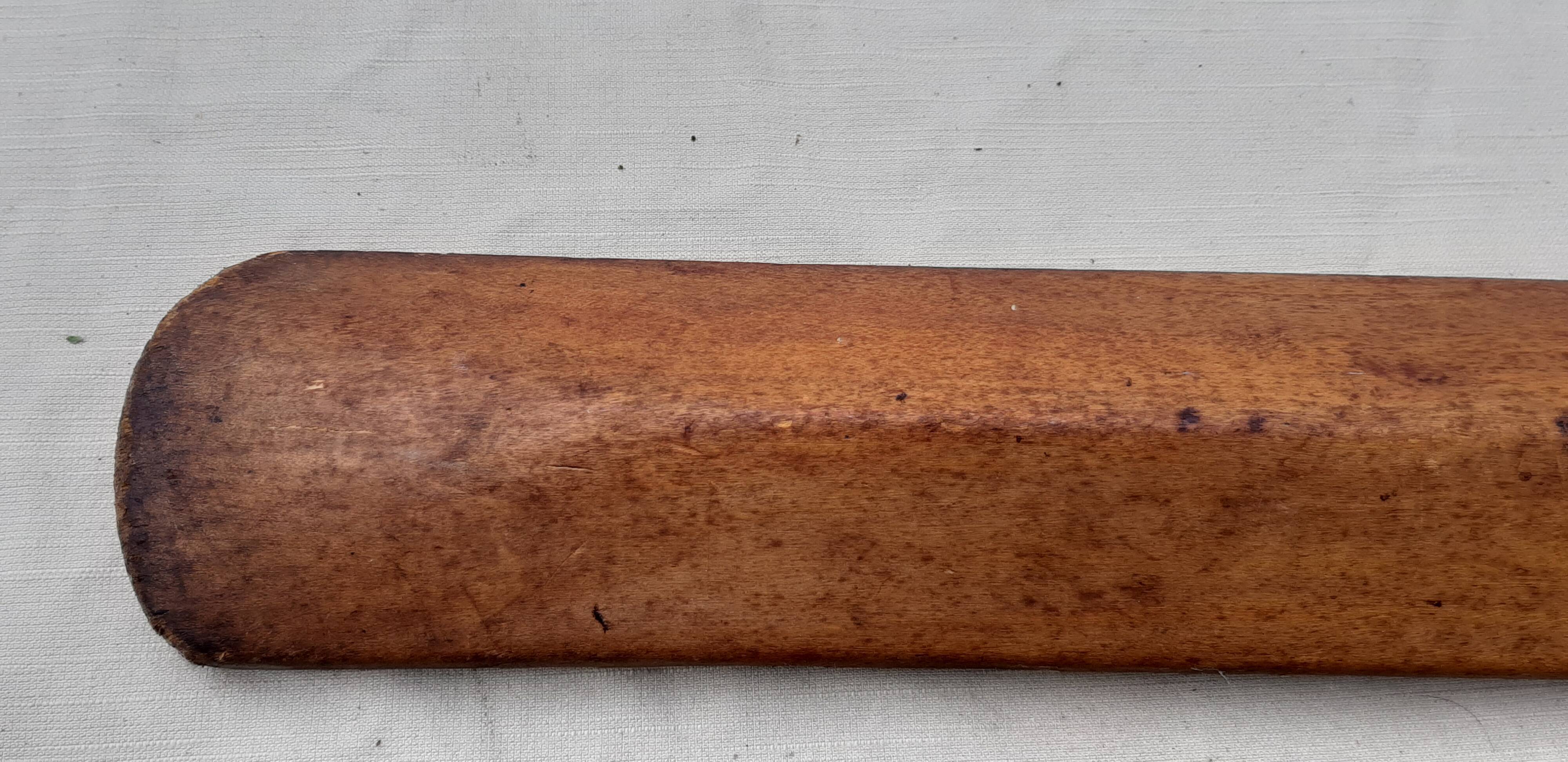 Ancient cricket bat in wood