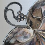 Old empty cut pocket in silver metal art nouveau in the shape of a sheet