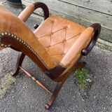 Chesterfield leather slipper chair with mahogany