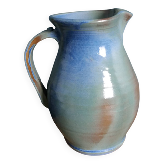 Enamel pitcher in pastel blue and green, signed