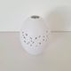 White porcelain egg vase