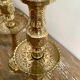 Pair of engraved brass candle holders