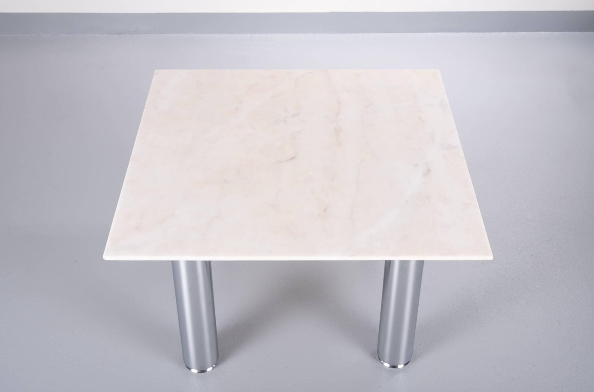 Wolfgang C.R. Mezger Marble on steel coffee table 1980s