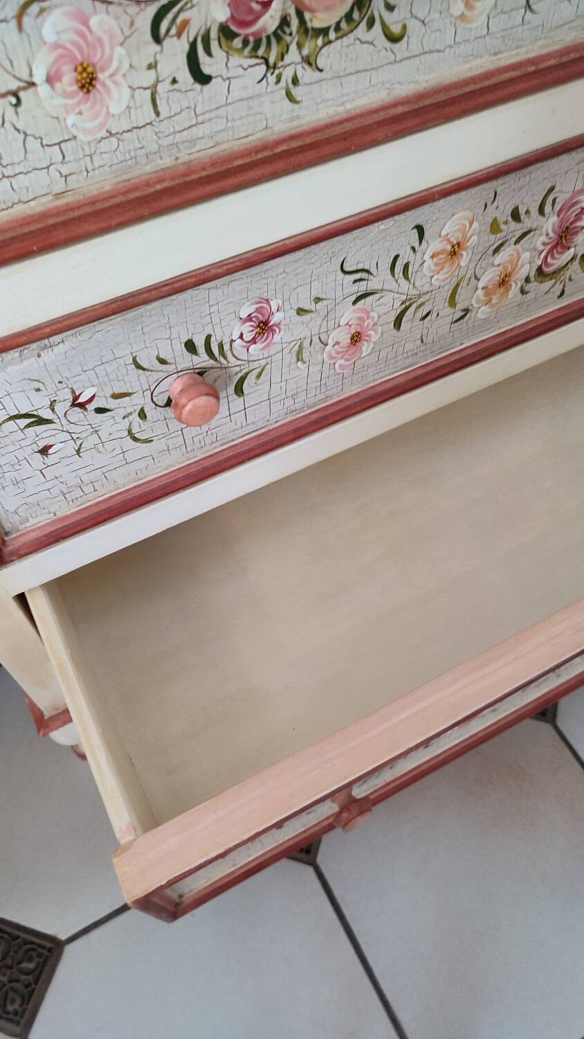 Painted chest of drawers with floral decoration