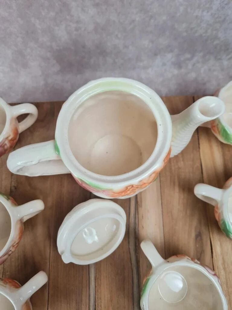 Adorable little vintage tea set in coloured earthenware.