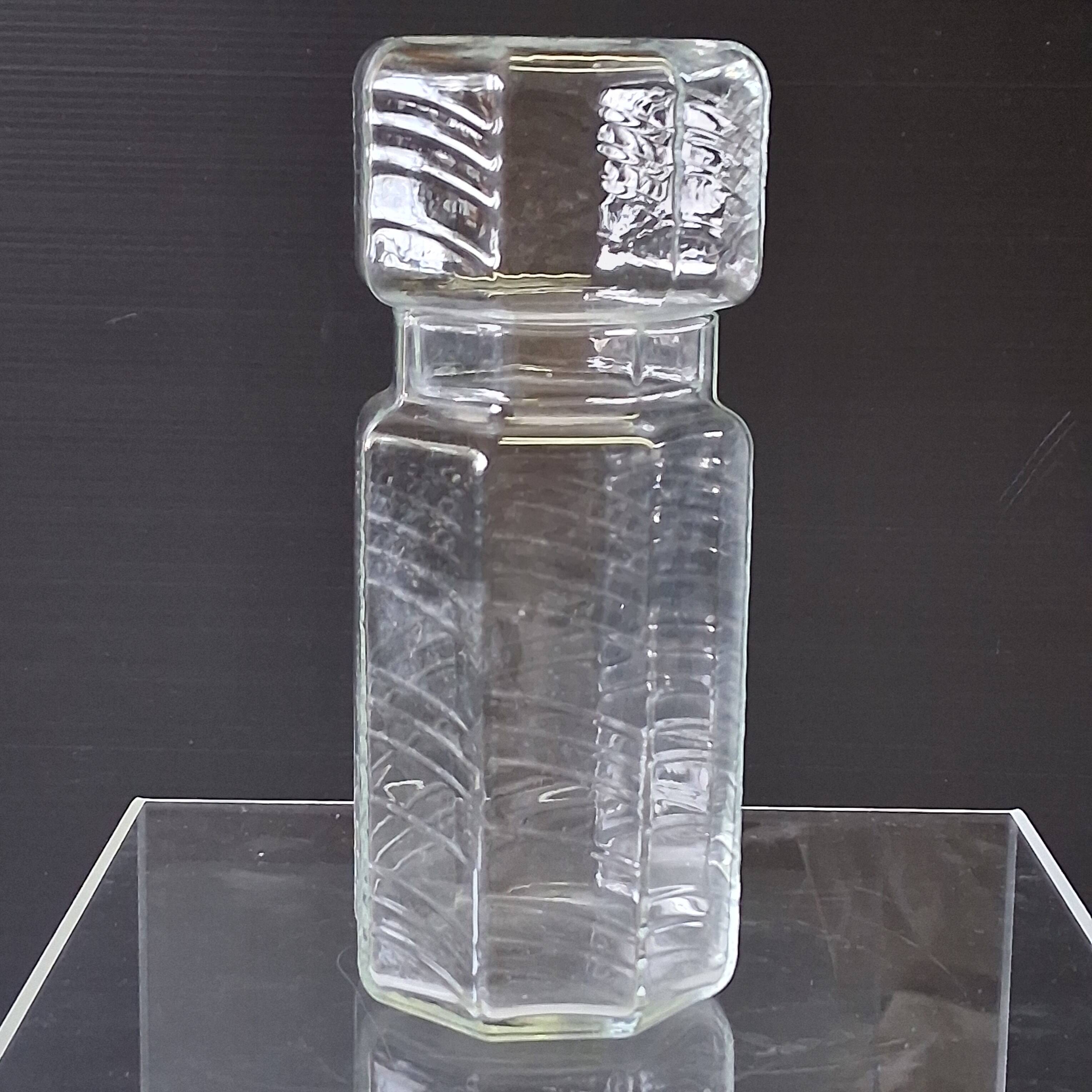 Set of 3 glass jars with old transparent lids in very good condition.