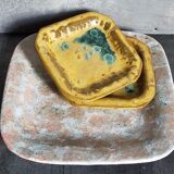 Set of three potter's plates in enamelled earth
