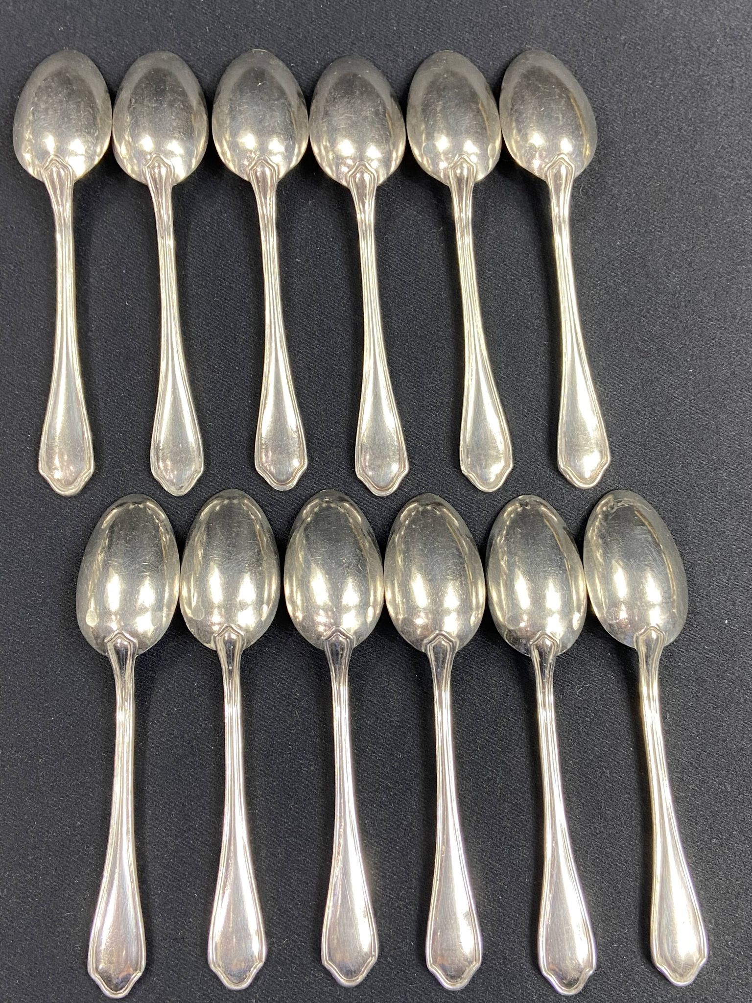 Complete set of 12 Louis XV style mocha spoons in silver-plated metal, Hermès