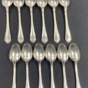 Complete set of 12 Louis XV style mocha spoons in silver-plated metal, Hermès