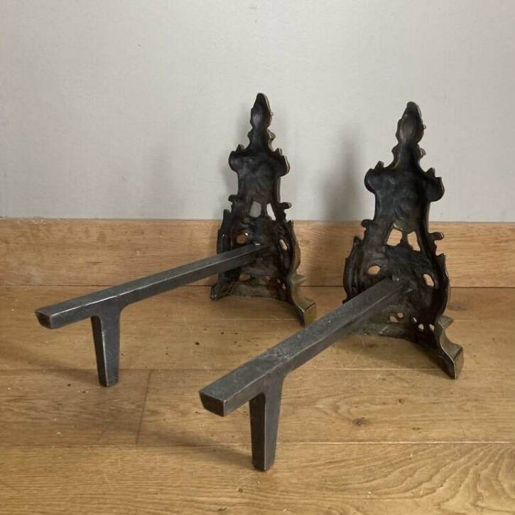 Pair of Louis XV andirons in solid bronze, early 20th century