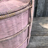 Old vintage pink rattan worker basket
