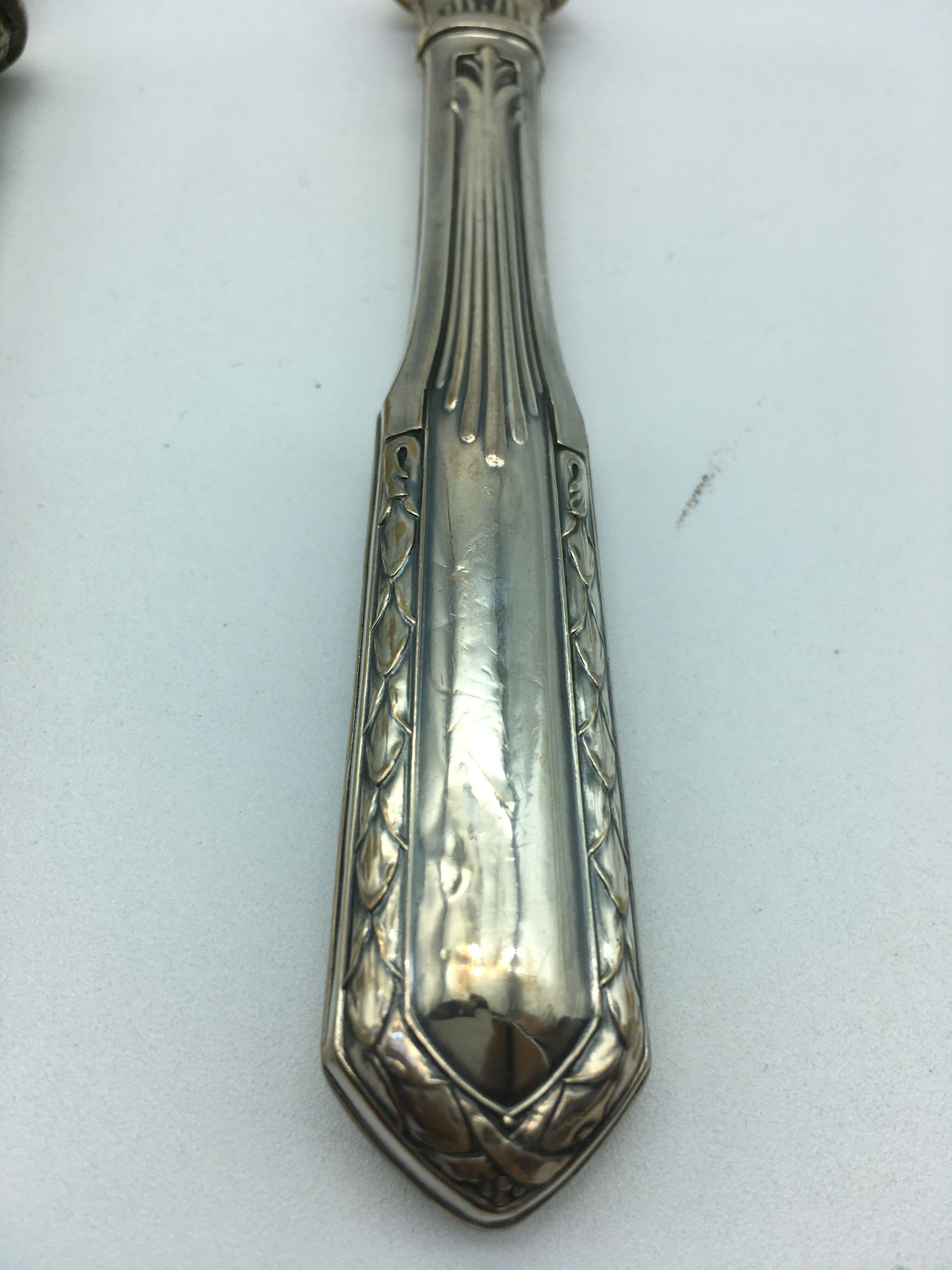 Box of filled silver salad cutlery