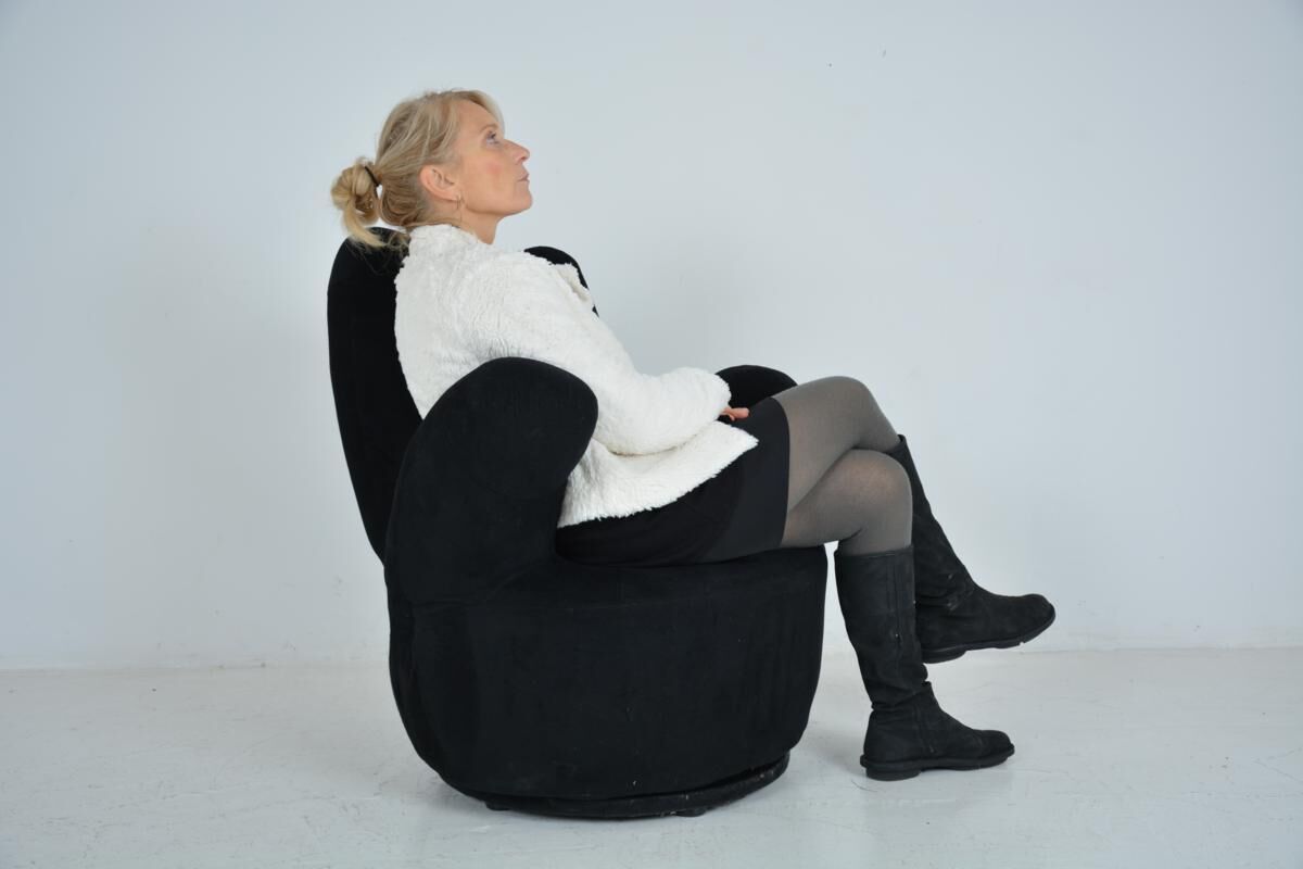 Fauteuil pivotant forme main datant des années 70